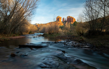 Sedona's iconic Cathedral Rock in morning light with Oak Creek flowing in the foreground, Crescent Moon Ranch, Sedona Arizona. 