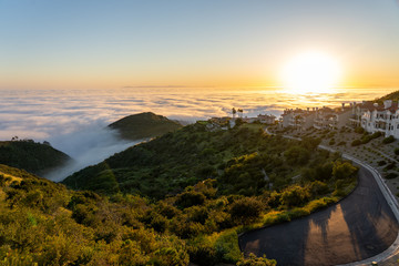 sunset over the clouds catalina laguna beach california © Isaac Gindi