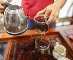 Brewing Chinese tea from the tea leaves.