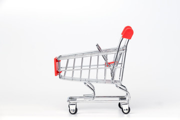 Empty trolley cart on a white background. Shopping, sale, finance, and business concept.