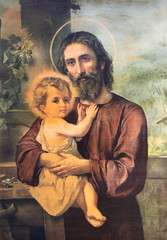Fototapeta na wymiar RAVENNA, ITALY - JANUARY 28, 2020: The painting of St. Joseph in church Chiesa di Santa Maria del Porto from 20. cent.