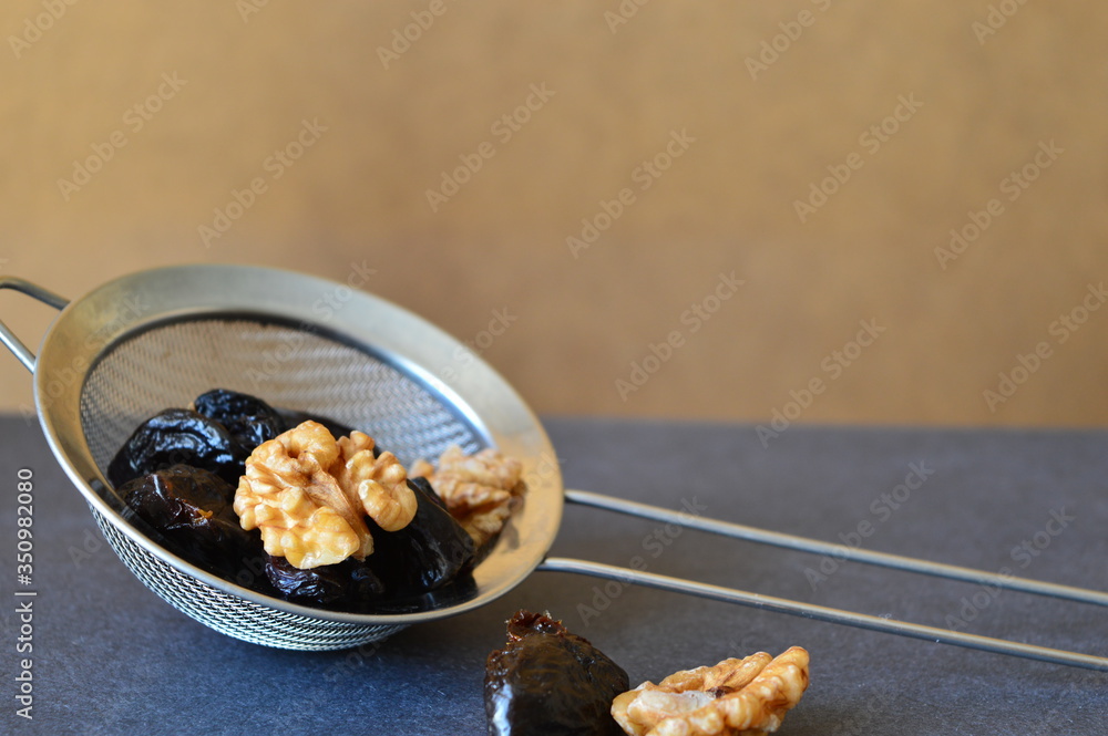 Wall mural dried fruits and nuts in the grid