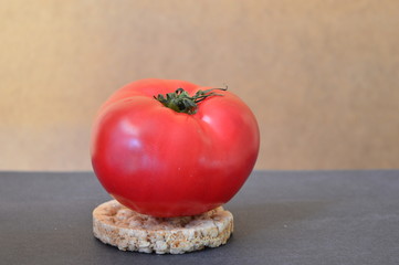 red tomato on a wheat bread 