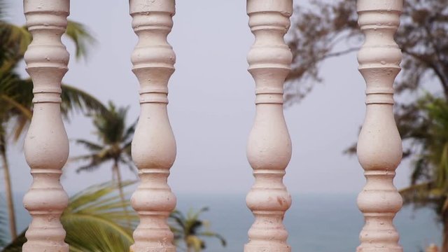 White balusters on the facade of the house. Classical architecture, balusters on the balcony