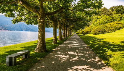 A very long walkway along lake Como in Bellagio Italy