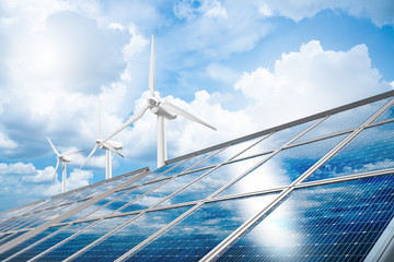 solar cell plant and wind generators under blue sky on sunset.Powerplant with photovoltaic panels...