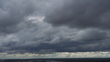 Changing weather conditions. Lots of storm clouds on the horizon. An ominous sky. The approach of the storm.