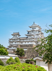 Obraz premium Himeji, Japan - May 06, 2019: Main tower of the Himeji Castle, the white Heron castle, Japan. UNESCO world heritage site after restauration and reopening.