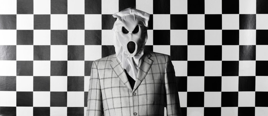 men in scary white mask on a black and white background