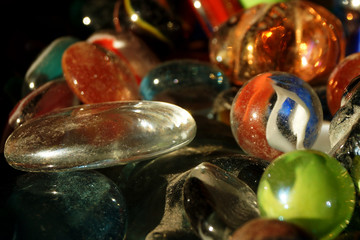 Multi-colored glass shiny balls and figurines for jewelry