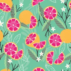 Fruit seamless pattern, grapefruit with branches, leaves and flowers on green background. Summer vibrant design. Exotic tropical fruit. Colorful vector illustration