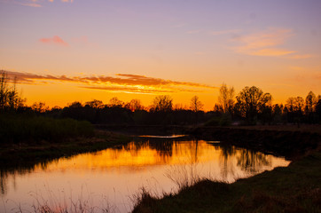 Fototapeta premium sunset over the river