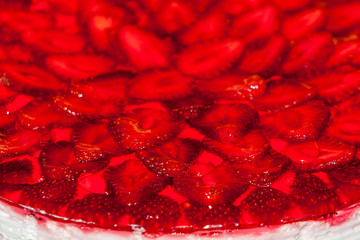Strawberry cheesecake with fresh sliced strawberries perfectly arranged