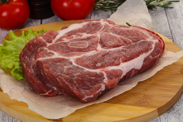 Raw pork neck steak
