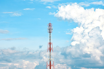 Telecommunication tower with beautiful blue sky with clouds. Anime sky clouds, anime style. Dramatic white clouds and sunlight. Sky background for animation or designer.