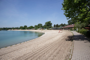 Fototapeta na wymiar Zagreb/Croatia-May 13th,2020: Beaches at Jarun lake cleaned and prepared for season as Croatia eases restrictive measures and ends lock down, allowing public gathering