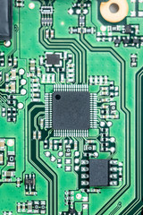 Printed circuit board (PCB) close-up shot with a lot of electronic components
