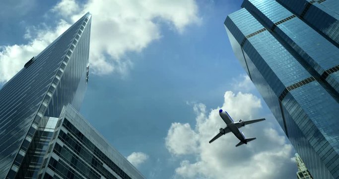 an airplane flying over the skyscrapers of the city of Beijing