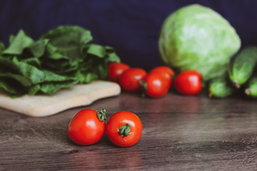 Vitamin set of vegetables on a dark background. Farm harvest. Seasonal vegetables of Ukraine.