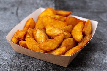 .french fries in disposable dishes