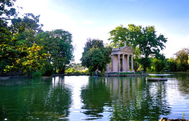 Fototapeta na wymiar The ruins of Temple of Aesculapius located in the gardens of the Villa Borghese in Rome, Italy.