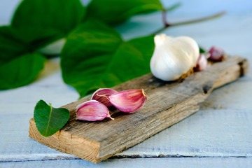 Garlic cloves on rustic table