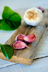 Garlic cloves on rustic table