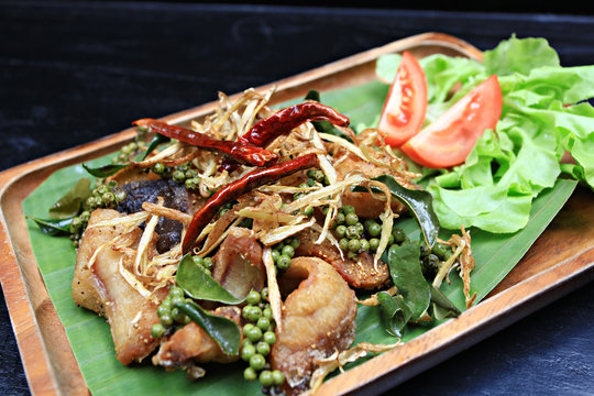 Stir-fried Spicy  Mae khong river fish with Fingerroot 