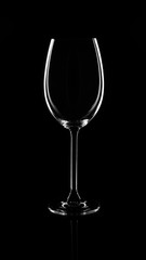 white wine glass on a dark background
