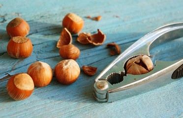 Nutcracker on a table. Fundamental stuff to open dried fruits like hazelnuts or nuts.