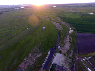 Aerial view of the saburb landscape (drone image). Near Kiev. Sunset time.