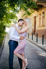 Naklejka premium Beautiful couple in love dating outdoors and smiling