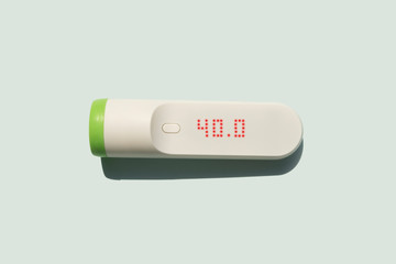 smart infra red thermometer showing high fever temperature 40