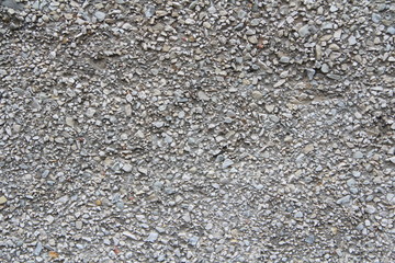 Asphalt wet crumb, rough dirty surface. Stock photo for web and print, background, scrapbooking and wallpaper with empy space for text and design.