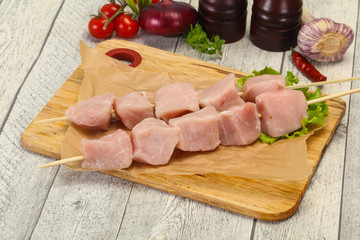 Raw pork meat skewer for grill