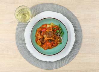 Beef balls with vegetables and tomato sauce