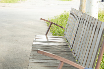 wooden bench in the street