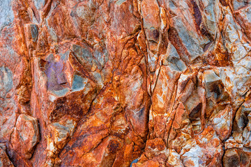 Abstract background from toned mountains texture, volcanic basalt as in Iceland. Bright colorful...