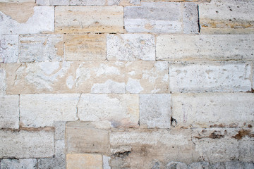 white old stone brick wall as background, pattern or texture