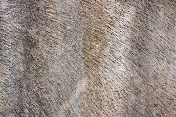 Macro, close-up of hand carved old stone as background, pattern or texture