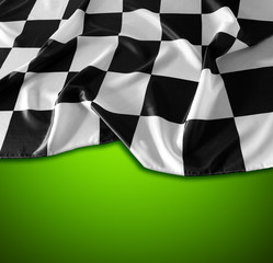 Checkered flag on green