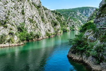 Fototapeta Matka Canyon and Matka Lake - located west of central Skopje, North Macedonia. It is one of the most popular outdoor destinations in Macedonia and home to several medieval monasteries obraz