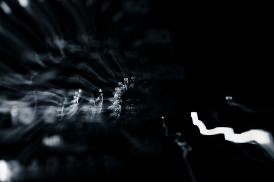 Driver's cockpit ; speedometer on dashboard - colorful light in black, copy space for your abstract design	