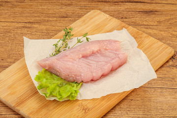 Raw turkey breast steak for cooking
