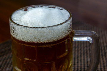 Mug with foamy beer
