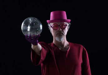 portrait of a magician man with a magic ball