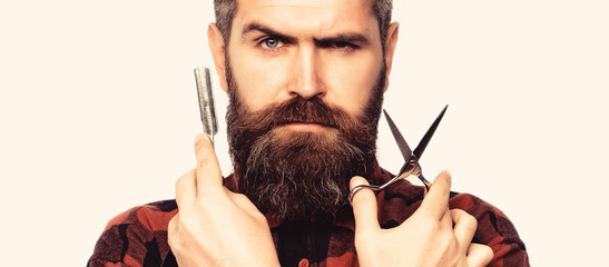 Bearded man, bearded male. Portrait of stylish man beard. Barber scissors and straight razor,...