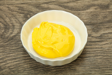 Natural cheese sauce in the bowl