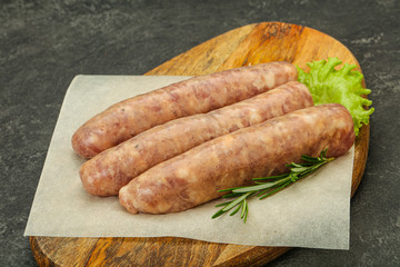 Raw pork meat sausages for grill