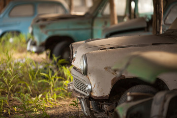 a cemetery with a lot of old abandoned cars